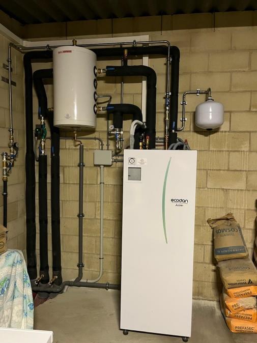 INSTALACIÓN AEROTERMIA CON MÁQUINA MITSUBISHI Y RADIADORES DE BAJA TEMPERATURA INSTALACIÓN AEROTERMIA CON MÁQUINA MITSUBISHI Y RADIADORES DE BAJA TEMPERATURA